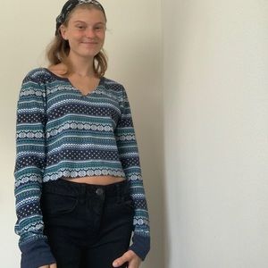 large blue and navy blue cropped V-neck thermal